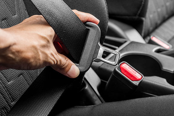 Man with functioning seatbelt 